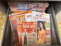 Drawer with visible McCall's Embroidery, Needlework, Mary Maxim Teen Age Doll Book and others