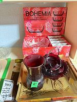 Bohemia fruit set in box, ruby vase, ruby bowl in stand, decorative tray visible