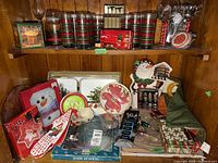 Shelf view showing dip chiller box, striped tumblers, cookie jar, wine glasses and red truck tin