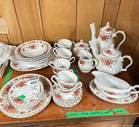 Full grouping of all china pieces on shelf