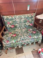 Front view of loveseat showing full frame and cushions