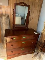 Full view of dresser with attached tilt mirror