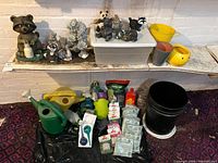 Full lot view showing ornaments on shelf, supplies and tools on floor