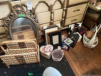 Group shot showing mirror, magazine rack, frames, baskets