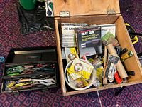 Toolbox and wooden box with power tool packaging and hardware