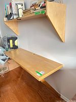 overall view of desk and one shelf mounted to wall