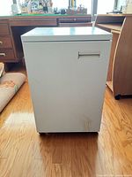 Front view closed showing recessed handle and stain