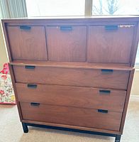 Front view showing entire dresser with drawers and compartments