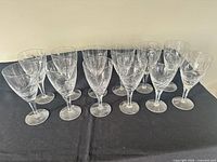 Full set of 12 Stuart Crystal Windermere wine glasses in one row