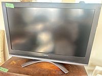 Front view of Toshiba LCD TV on stand