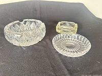 All three glass pieces on black backdrop