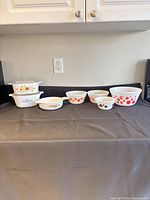 All casserole dishes and mixing bowls arranged together