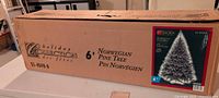 Full view of boxed Holiday Collection 6' Norwegian Pine Tree model 51-4549-0