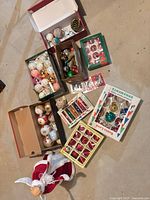 Overhead view of all boxed ornaments, loose ornaments, and angel topper