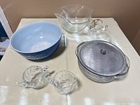 Group shot of all items in lot on table