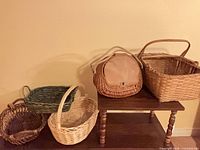 All five wicker baskets arranged on shelf