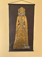 Full view of brass rubbing artwork hanging on wall