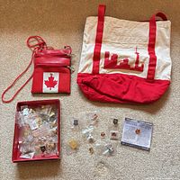 Overall lot showing shoulder pouch, tote bag, box of pins