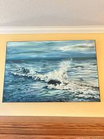 Overall view of seascape painting on wall