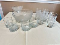 Overall lot showing chip bowl with dip bowl and eight glasses