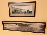 Both framed photographs hung on wall