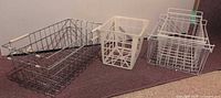 overview of chrome wire basket, plastic basket and nested chrome/white baskets