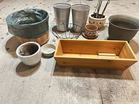 Group shot showing all planters, buckets, baskets and boxes