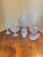 Group shot of all seven clear glass items