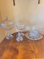 Group shot of all five clear glass serving pieces