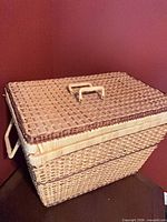 Overall view of wicker basket with lid closed