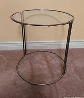 Full view of larger round chrome and glass side table