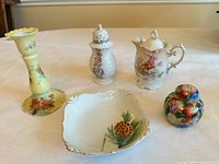 Group shot of five porcelain items