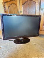 Front view of Samsung SyncMaster P2770HD monitor on stand