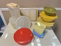 Group shot of all Tupperware pieces arranged on table