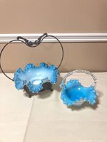 Large and small blue and white slag glass baskets with stand