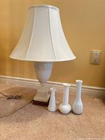 Full view of lamp with shade and three vases
