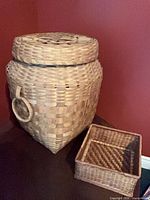 Large lidded basket and smaller square basket overview