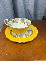Teacup, saucer and plate showing full set