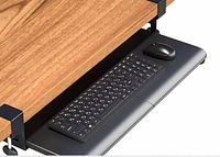 Tray installed under desk with keyboard and mouse