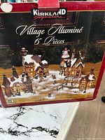 Retail box showing Kirkland Signature Village Illuminé 15 Pieces