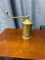 Full view of brass sev sancha assembled on tabletop