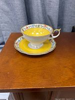 Teacup on saucer showing overall design and colors