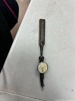 Full view of indicator with shank and dial