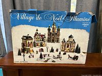 Front of original box showing illustrated contents and brand