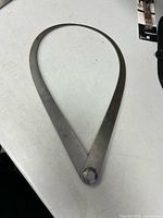 Full view of caliper closed on tabletop