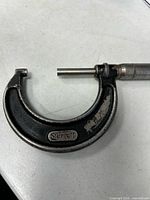 Full view of Starrett outside micrometer showing frame and spindle