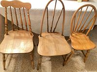 All three wooden chairs side by side