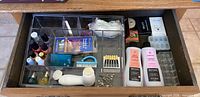 Drawer view showing acrylic organizer and contents