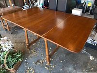 Top view with both leaves up showing full width and surface wear.