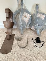 Entire lot with two packaged gray bell sconces, brown sconce and loose candle parts